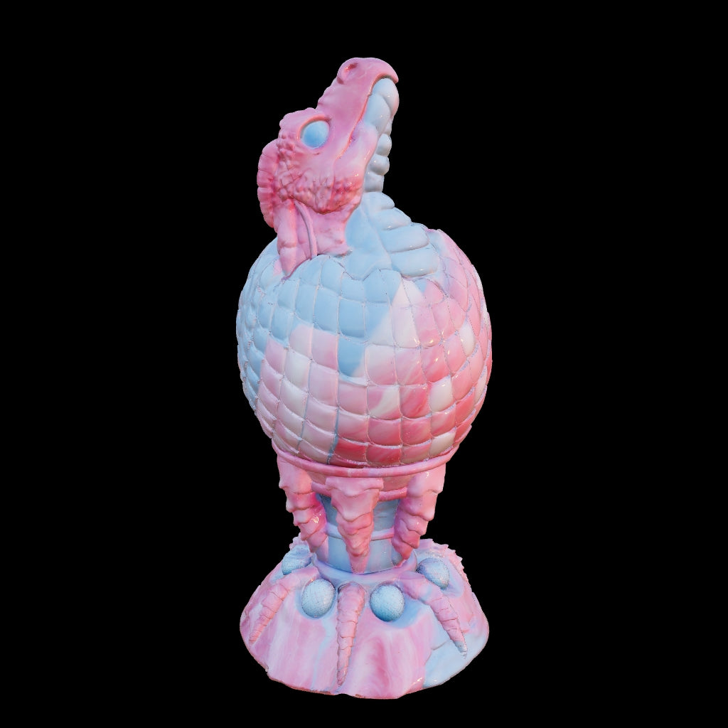 The Fire Egg Fantasy Plug. Textured dragon egg with hatching head at the tip and sculpted dragon claw safety base. Platinum Silicone by ClimaxLab.