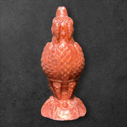 The Fire Egg Fantasy Plug. Textured dragon egg with hatching head at the tip and sculpted dragon claw safety base. Platinum Silicone by ClimaxLab.