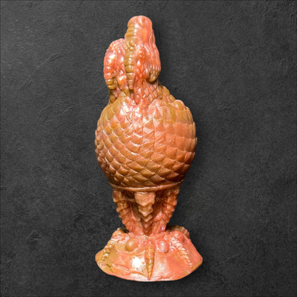 The Fire Egg Fantasy Plug. Œuf de dragon texturé avec tête en éclosion à la pointe et base de sécurité en griffe de dragon sculptée. Silicone Platine par ClimaxLab.