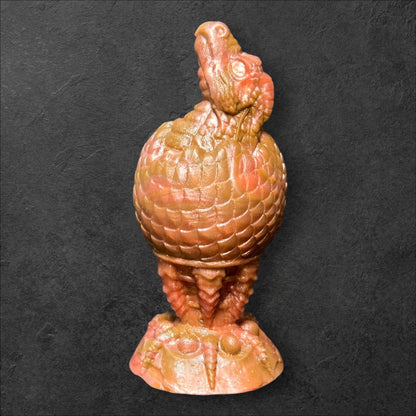 The Fire Egg Fantasy Plug. Œuf de dragon texturé avec tête en éclosion à la pointe et base de sécurité en griffe de dragon sculptée. Silicone Platine par ClimaxLab.
