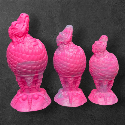 The Fire Egg Fantasy Plug. Œuf de dragon texturé avec tête en éclosion à la pointe et base de sécurité en griffe de dragon sculptée. Silicone Platine par ClimaxLab.