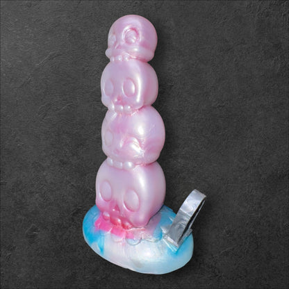 Tower of Souls Dildo with Stacked Skulls Texture. Platinum Silicone Fantasy Toy by ClimaxLab.
