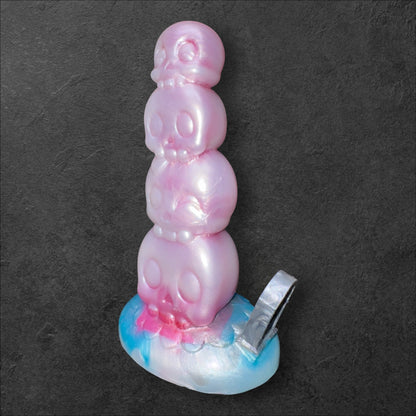 Tower of Souls Dildo with Stacked Skulls Texture. Platinum Silicone Fantasy Toy by ClimaxLab.